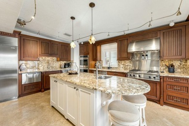 Stunning Plantation Key canal front pool home! This exceptional - photo 18