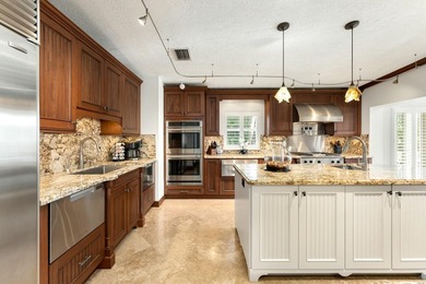 Stunning Plantation Key canal front pool home! This exceptional - photo 19