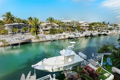 Stunning Plantation Key canal front pool home! This exceptional - photo 45