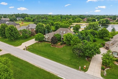 Nestled on a breathtaking lot, this CUSTOM home offers luxurious - photo 2