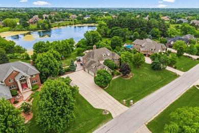 Nestled on a breathtaking lot, this CUSTOM home offers luxurious - photo 3