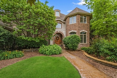Nestled on a breathtaking lot, this CUSTOM home offers luxurious - photo 5