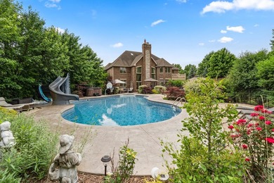 Nestled on a breathtaking lot, this CUSTOM home offers luxurious - photo 10