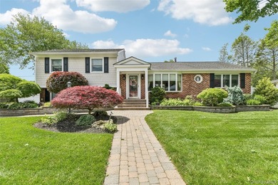 Fantastic Opportunity in Harborfields SD! Pristine Split-Level - photo 1