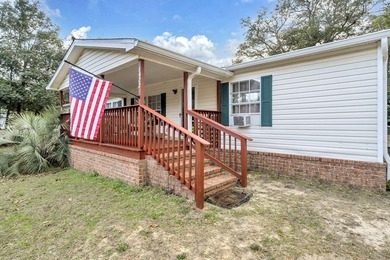 Welcome to 1422 Cat Mar Rd in Niceville -- a spacious and - photo 1