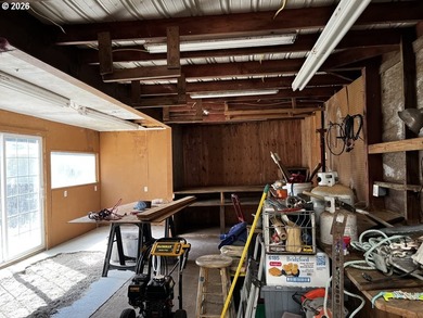 This charming 2-bedroom, 1-bath manufactured home sits on a - photo 5