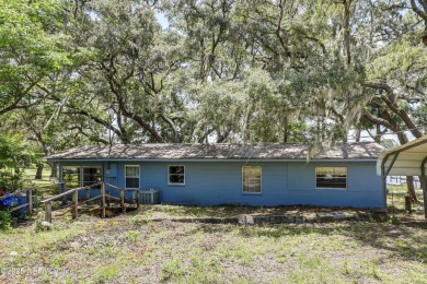 Lake Home For Sale in Pomona Park, Florida