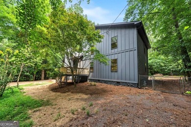 Welcome to this stunning, completely renovated home nestled on a - photo 2