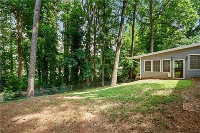 Welcome to this spacious brick ranch in the heart of Tucker - photo 50