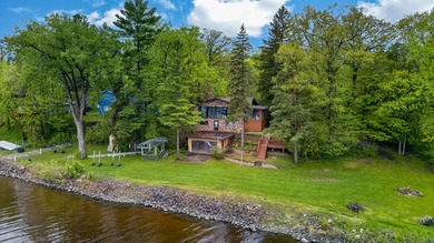 Discover a truly unique lakefront retreat filled with character - photo 1