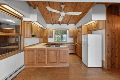 Discover a truly unique lakefront retreat filled with character - photo 5