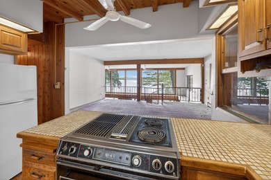 Discover a truly unique lakefront retreat filled with character - photo 6