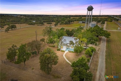 Step into a rare piece of Texas history with this 1905 two-story