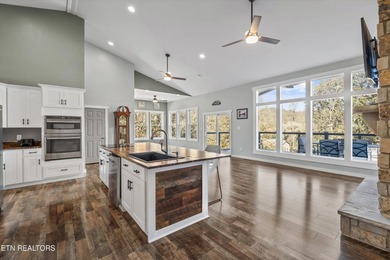 Situated on 1.48 acres of wooded land with stunning lake views - photo 12