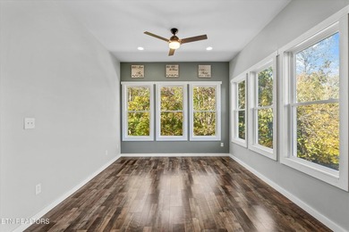 Situated on 1.48 acres of wooded land with stunning lake views - photo 16