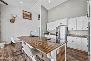Situated on 1.48 acres of wooded land with stunning lake views - photo 17