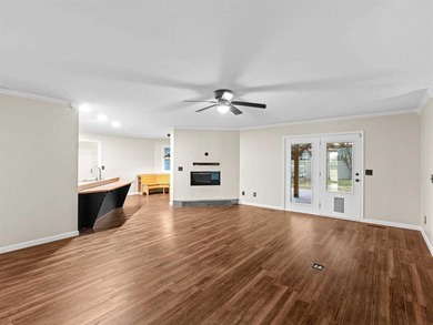 Welcome to this gorgeous 4 bedroom, 2.5 bathroom all-brick ranch