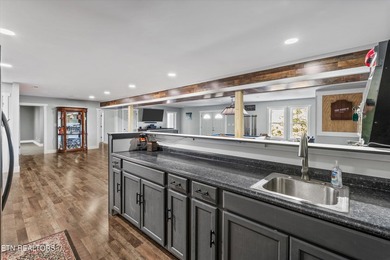 Situated on 1.48 acres of wooded land with stunning lake views - photo 34