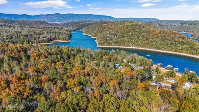 Situated on 1.48 acres of wooded land with stunning lake views - photo 45