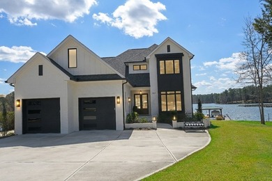 Where Lakefront Luxury Meets Timeless Design.  524 Grand Harbor