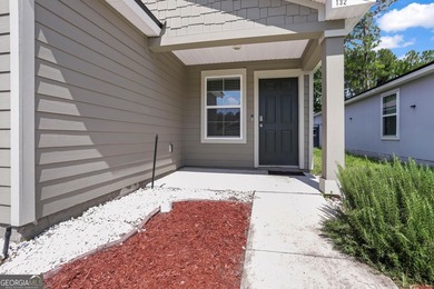 Welcome to Bartram Place! This 3-bedroom, 2-bath home offers a - photo 3