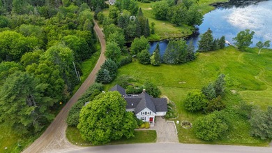 Set along the shore of Meadow Pond on Islesboro, this - photo 38