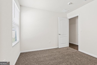 Welcome to Bartram Place! This 3-bedroom, 2-bath home offers a - photo 10
