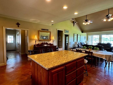 This exquisite four-bedroom camp, complemented by an attached - photo 6