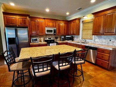 This exquisite four-bedroom camp, complemented by an attached - photo 9
