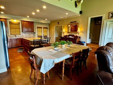 This exquisite four-bedroom camp, complemented by an attached - photo 10