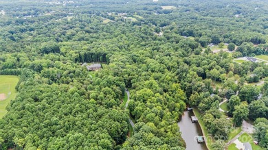 A crown jewel of Lake Norman, this 33-acre private estate offers - photo 6