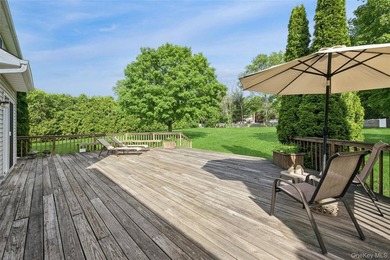 Welcome to 3 Naomi Court, a timeless 5-bedroom, 4.5-bath Center - photo 33