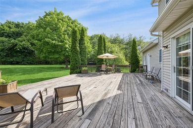 Welcome to 3 Naomi Court, a timeless 5-bedroom, 4.5-bath Center - photo 35