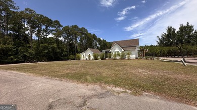 A cleared and build-ready lot in Cumberland Harbour, bring your - photo 5