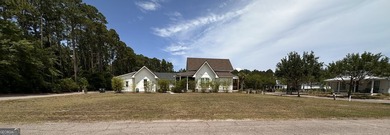 A cleared and build-ready lot in Cumberland Harbour, bring your - photo 8