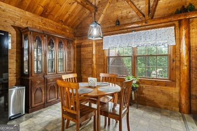 Rustic charm meets modern comfort in this beautiful log home - photo 5