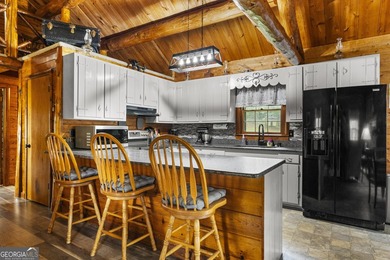 Rustic charm meets modern comfort in this beautiful log home - photo 8