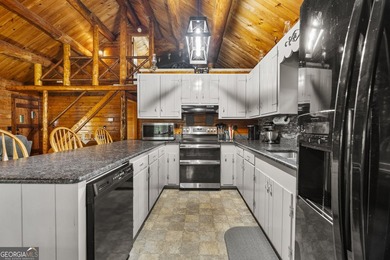 Rustic charm meets modern comfort in this beautiful log home - photo 9