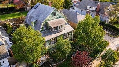 Renovation Opportunity: One family home on an elevated lot in - photo 1