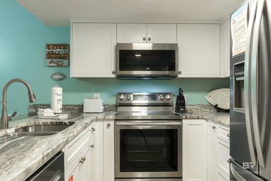 This beautifully updated, turnkey condo is located on West Beach - photo 4