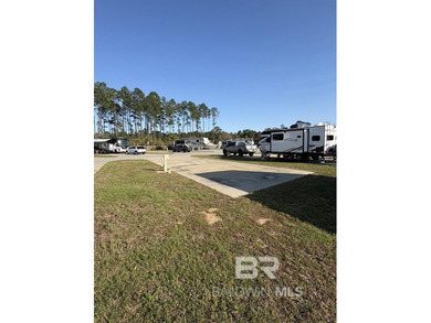 Lot 67 in Whispering Pines RV Resort offers a deeded RV lot in - photo 3