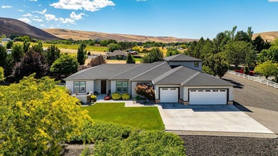 MLS# 293826 Perched on a beautifully landscaped homesite with - photo 1