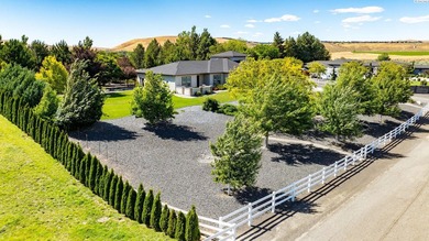 MLS# 293826 Perched on a beautifully landscaped homesite with - photo 5
