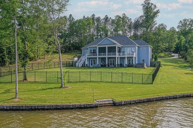 Positioned on a spectacular 2.4 acre lot with 267-foot lakefront - photo 11