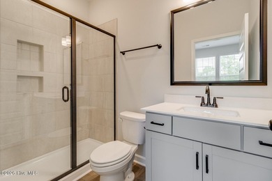 The Nottely is a two-story home with five bedrooms and three and - photo 12