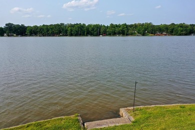 Positioned on a spectacular 2.4 acre lot with 267-foot lakefront - photo 13