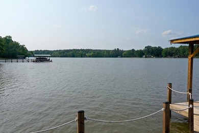 Positioned on a spectacular 2.4 acre lot with 267-foot lakefront - photo 14