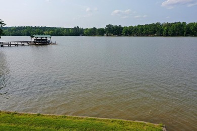 Positioned on a spectacular 2.4 acre lot with 267-foot lakefront - photo 15