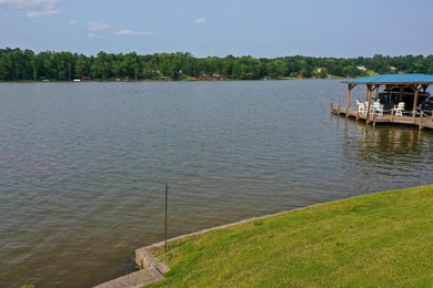 Positioned on a spectacular 2.4 acre lot with 267-foot lakefront - photo 16