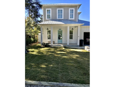 As you walk into this custom build you'll enjoy open living at - photo 5